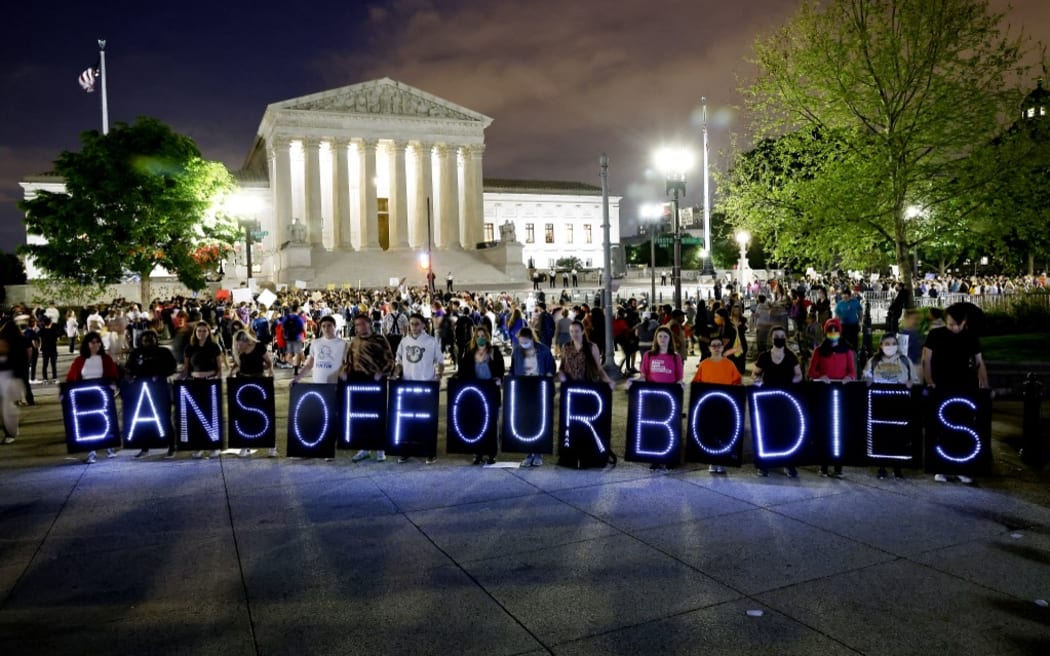 WASHINGTON, DC - MAY 03: MoveOn and Abortion Access activists rally outside the Supreme Court of the United States to demand keep the #BansOffOurBodies on May 03, 2022 in Washington, DC.   Paul Morigi/Getty Images for MoveOn/AFP (Photo by Paul Morigi / GETTY IMAGES NORTH AMERICA / Getty Images via AFP)