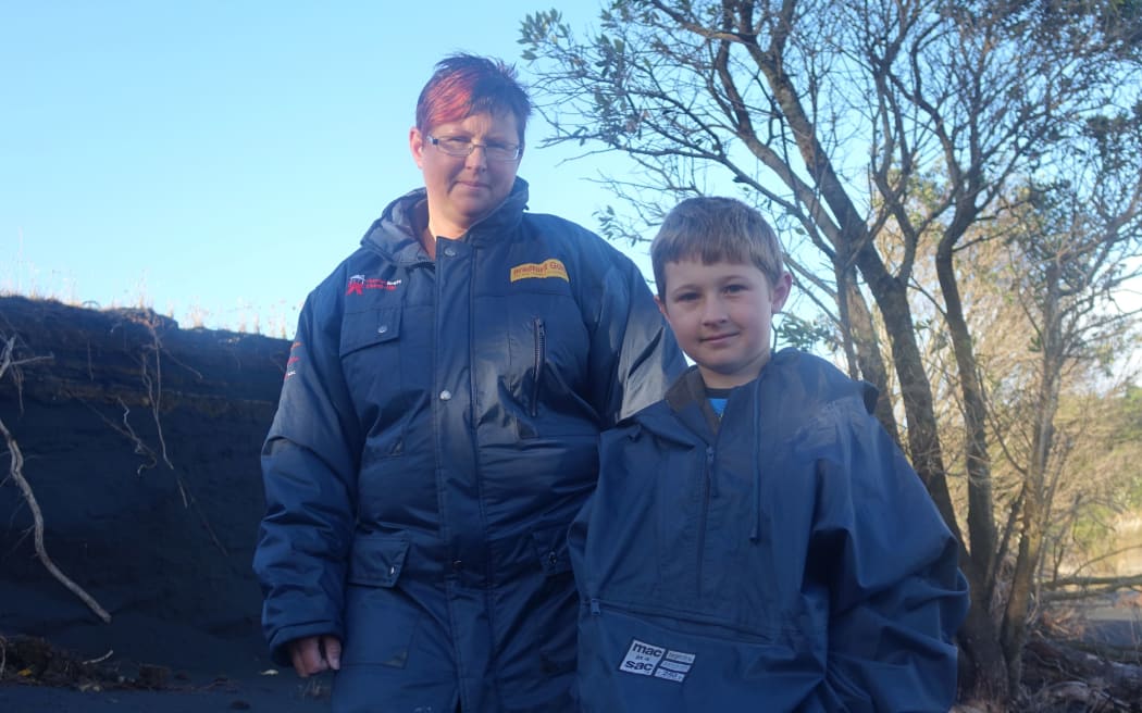 Teresa Hayston and her son Aidan help look after the nesting boxes.