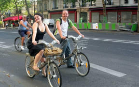 Happy velib riders on the day of its inauguration on Boulevard Beaumarchais