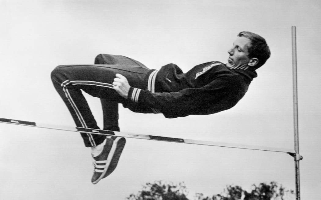 American high jump champion Dick Fosbury clears the bar during practice in Mexico in 1968.