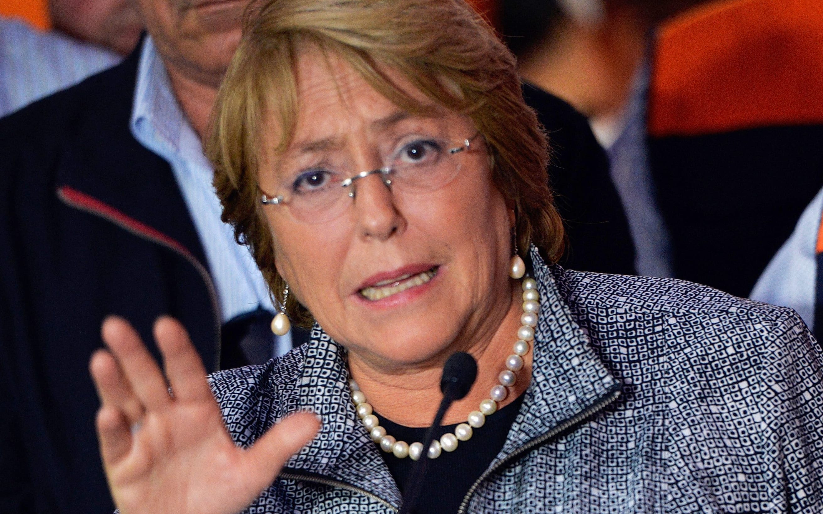 President Michelle Bachelet was moved to higher ground while visiting the damaged city of Arica.