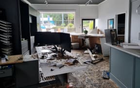 Business owner Mathew Coles says he saw his Kitchen Design business under water in a matter of seconds.
