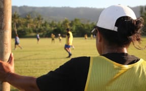 Fila Fuamatu strategizing from the side line.