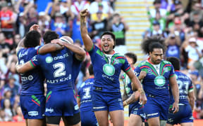 Warriors players celebrate their win following the NRL Round 11 match between the New Zealand Warriors and the Penrith Panthers at Suncorp Stadium in Brisbane, Sunday, May 19, 2024. (AAP Image/Dave Hunt/ Photosport)