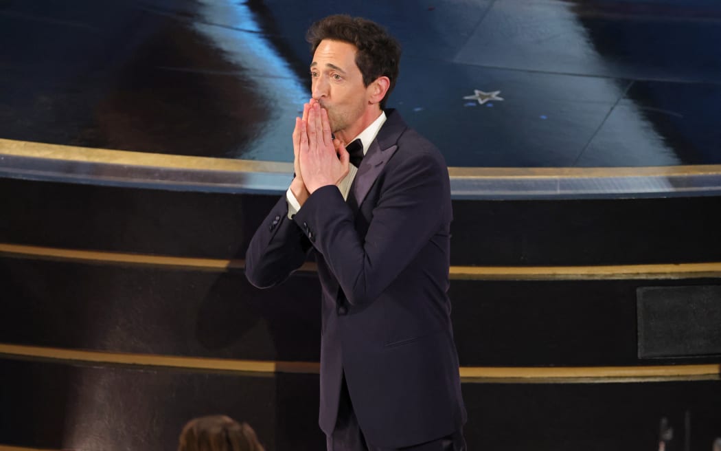 HOLLYWOOD, CALIFORNIA - MARCH 02: Adrien Brody accepts the Best Actor In A Leading Role award for "The Brutalist" onstage during the 97th Annual Oscars at Dolby Theatre on March 02, 2025 in Hollywood, California.   Kevin Winter/Getty Images/AFP (Photo by KEVIN WINTER / GETTY IMAGES NORTH AMERICA / Getty Images via AFP)