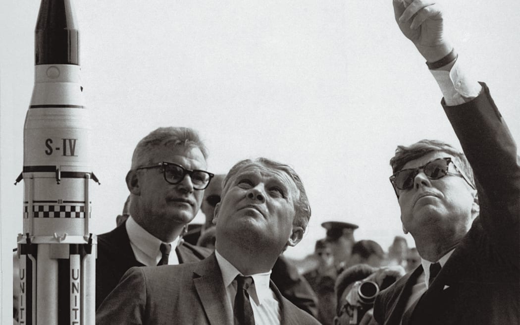 NASA Administrator Robert C. Seamans Jr. (L, 1918-2008) and US Scientist Wernher Von Braun (C, 1912-1977), ex-nazi and father of the Saturn V Rocket which took the US astronauts to the Moon, are seen in November 1963 showing US President John F. Kennedy (R) the Cap Canareval launching pad. AFP PHOTO NASA (Photo by Handout / NASA / AFP) / RESTRICTED TO EDITORIAL USE - MANDATORY CREDIT "AFP PHOTO / NASA " - NO MARKETING NO ADVERTISING CAMPAIGNS - DISTRIBUTED AS A SERVICE TO CLIENTS - RESTRICTED TO EDITORIAL USE - MANDATORY CREDIT "AFP PHOTO / NASA " - NO MARKETING NO ADVERTISING CAMPAIGNS - DISTRIBUTED AS A SERVICE TO CLIENTS /