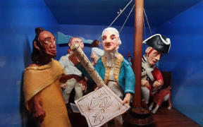 Tupaia, left, with the Englishmen on the Endeavour.