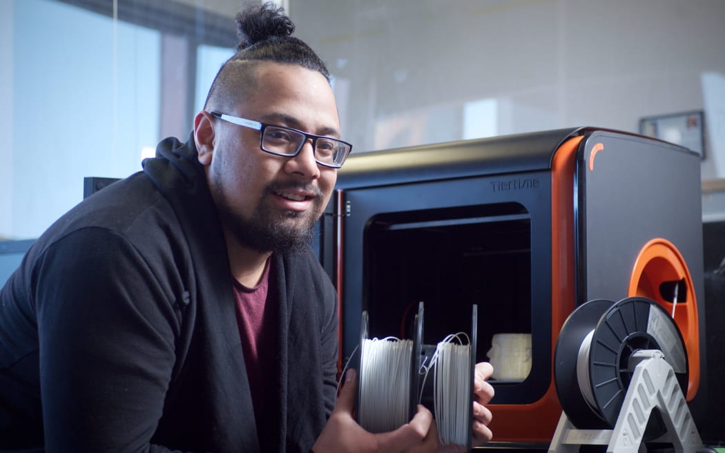 Victoria University student Lionel Taito-Matamua with a 3D printer.