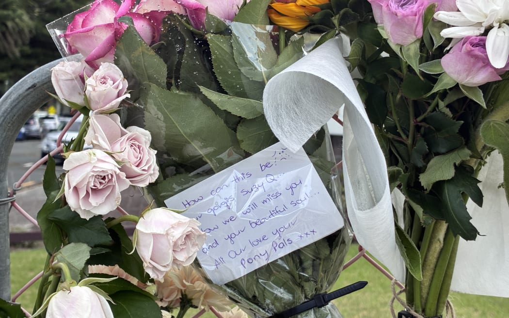 A floral tribute left for Susan Knowles at the Mt Maunganui landslide cordon.