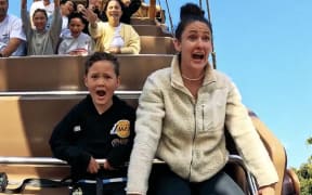 Gus Thornton, 7, and his mum, Nicky Park, are amongst the first passengers on the new pirate ship ride at Rainbow's End.