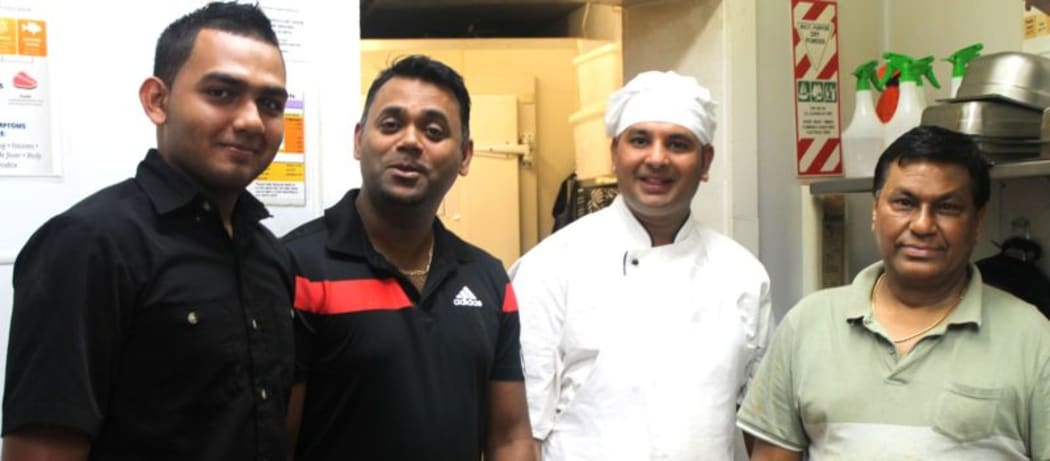 This is an image  of Rajesh Kumar (second from left)  and his kitchen team