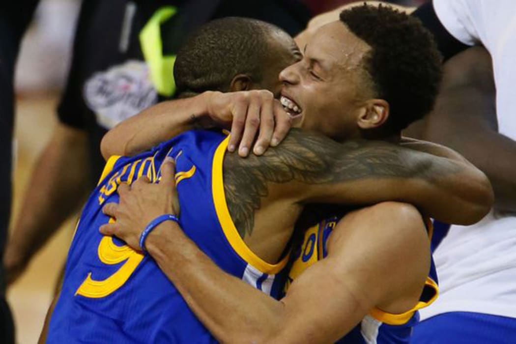 Andre Iguodala and Steph Curry of the Golden State Warriors.