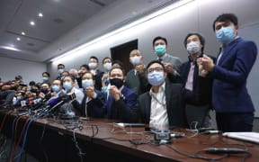 Pan-democratic legislators hold a press conference to resign from the Legislative Council en masse after Alvin Yeung Ngok-kiu, Kwok Ka-ki, Kenneth Leung and Dennis Kwok were disqualified when China passed a new resolution in Hong Kong.