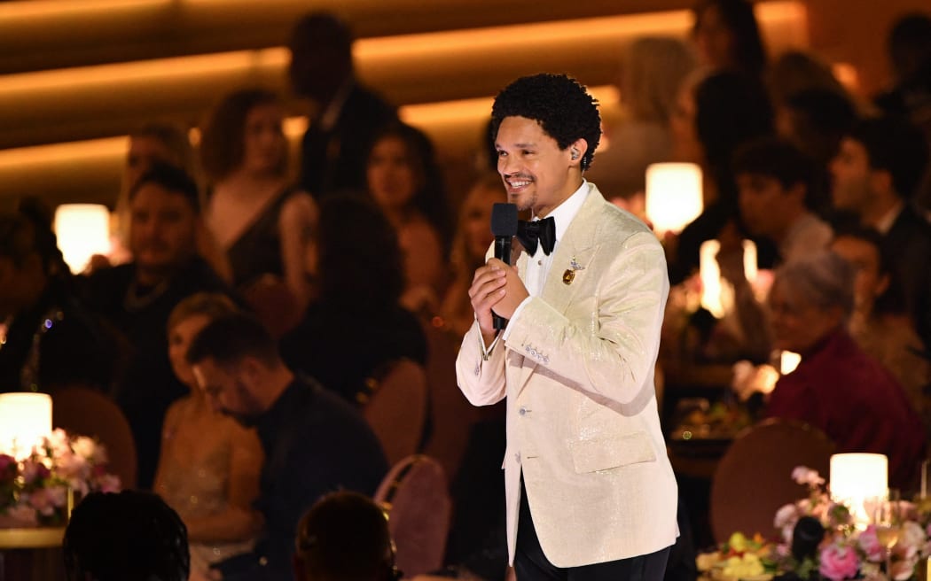South African comedian and host Trevor Noah speaks during the 66th Annual Grammy Awards at the Crypto.com Arena in Los Angeles on February 4, 2024.