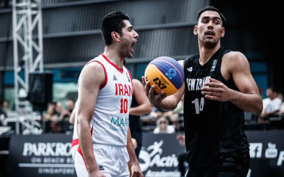 New Zealand basketballer Tai Wynyard, right.