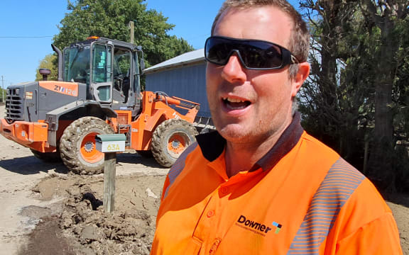 Derrick Theobald was on the loader, clearing up debris on the edges of the roads in Hawke's Bay after Cyclone Gabrielle.