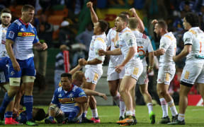 Tawera Kerr-Barlow and the Chiefs celebrate their win over the Stormers in Capetown.
