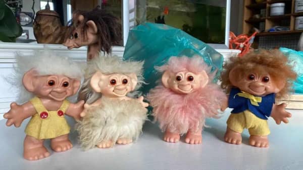 "The smile on the Trolls, you couldn't walk away from it," Sutton says.