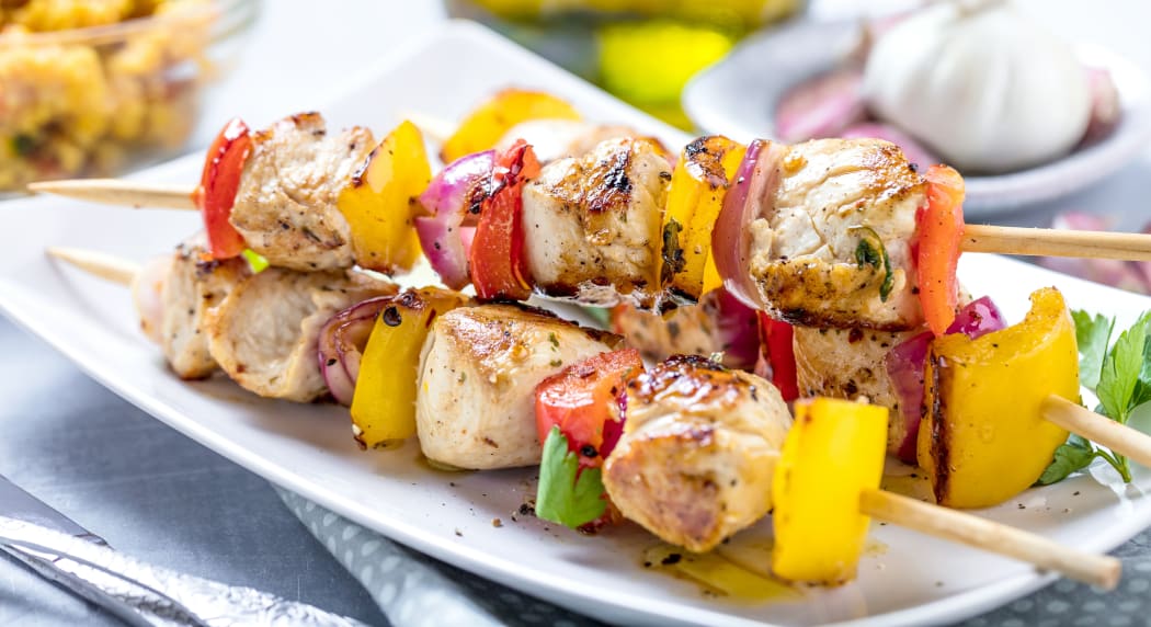Grilled skewers of vegetables and meat on the Table