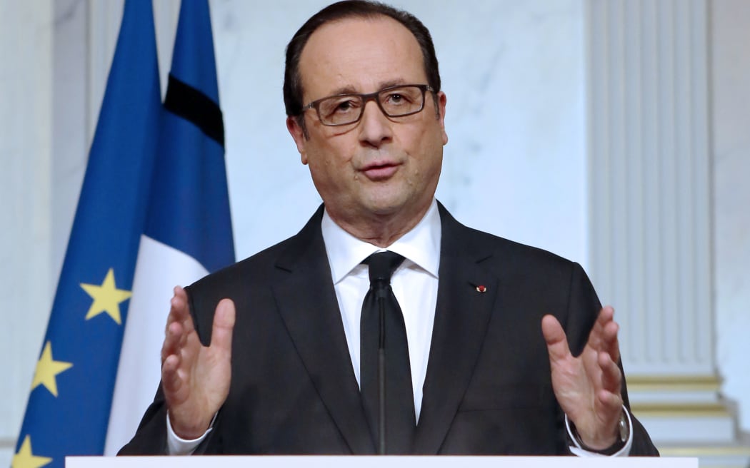 French President Francois Hollande addresses the nation during a televised speech at the Elysee Palace in Paris.