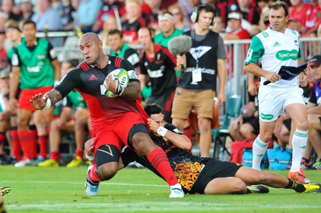 Nemani Nadolo of the Crusaders is tackled by Shaun Stevenson of the Chiefs during the Super Rugby Match, Crusaders V Chiefs in Christchurch.