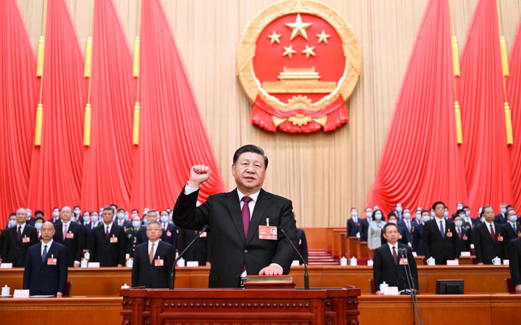 Xi Jinping makes a public pledge of allegiance to the Constitution at the Great Hall of the People in Beijing, capital of China, 10 March, 2023.