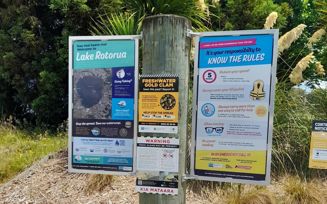 New signs warn lake users about the risk of toxic algal blooms.