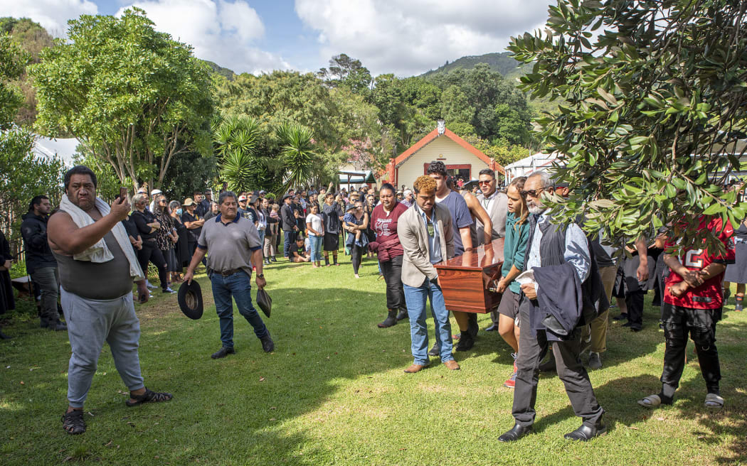 Te Kahautu Maxwell leads the funeral service at Maraenui Marae yesterday.