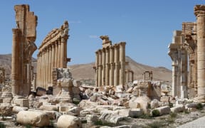 The remains of the Arch of Triumph in the ancient Syrian city of Palmyra after its recapture on 27 March 2016.