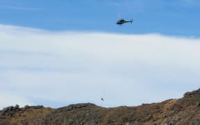 Greenlea Rescue Helicopter using a long line to rescue a tramper.