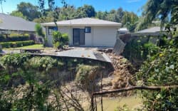 Houses on Joll Road in Havelock North were inundated with contaminated mud during Cyclone Gabrielle, but the community and Navy pitched in to help clean up the street and homes.