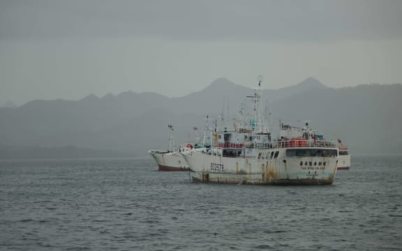A fishing trawler sits in Suva Harbour, Fiji.