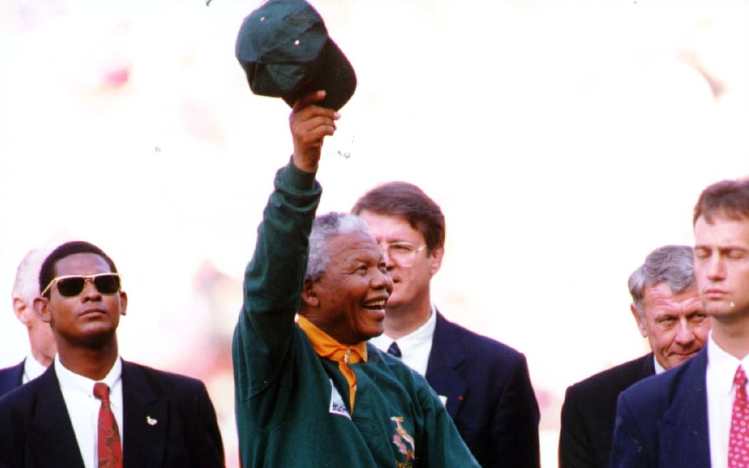 Nelson Mandela acknowledges the crowd at the Rugby World Cup 1995.