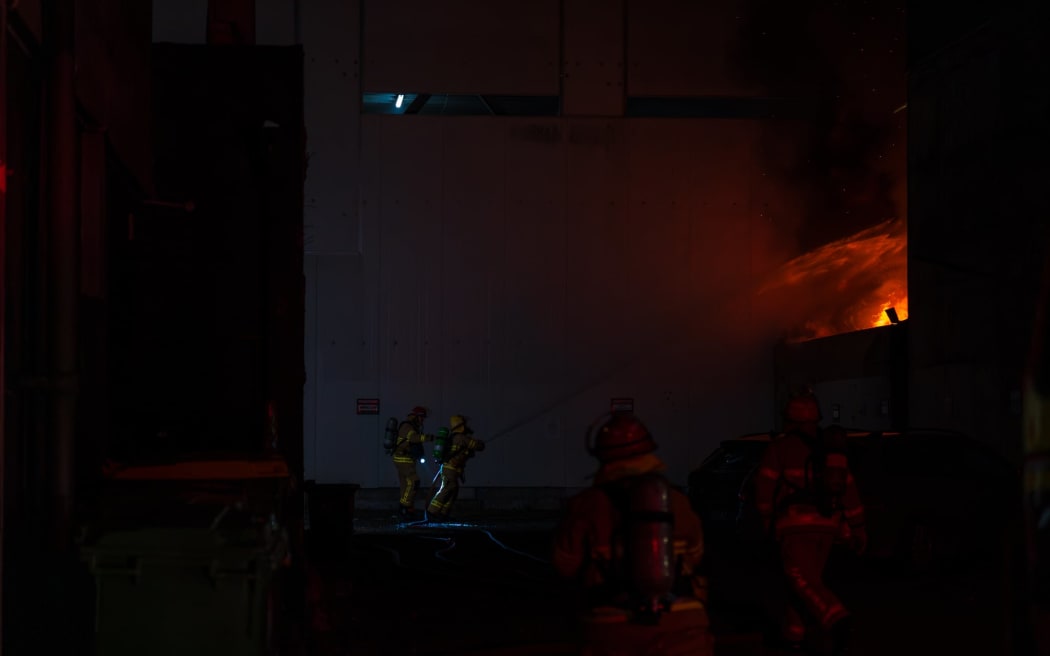Firefighters battle a blaze on Wellington's Tory Street.