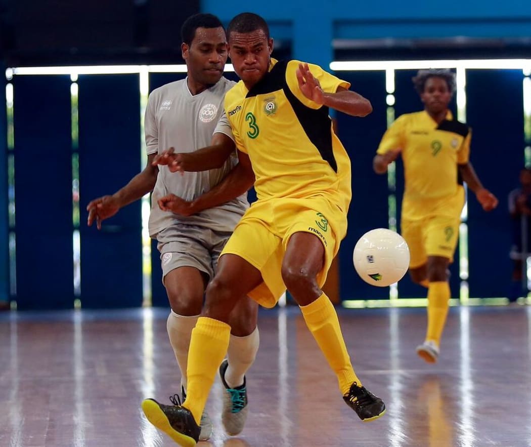 Vanuatu's Don Mansale in possession.