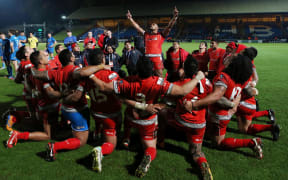 Tonga perform their haka after playing Italy at the 2013 World Cup in England.