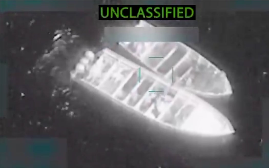 This screengrab taken from a video posted by Defense Secretary Pete Hegseth, shows two boats shortly before they are struck by a missile, in the Eastern Pacific on 27 October, 2025.