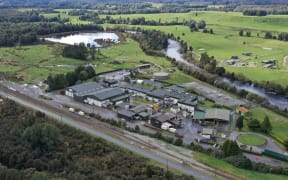 The ANZCO Kokiri processing plant with the Arnold River in the background.