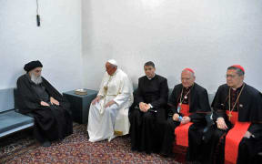 Iraq's most revered Shiite Islam cleric, Grand Ayatollah Ali al-Sistani (left) meeting with Pope Francis and his delegation, at his home in the Iraqi city of Najaf, on 6 March.