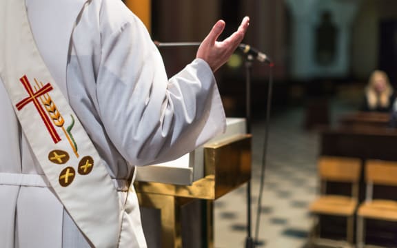 Catholic church priest during a ceremony mass