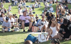 America's Cup fans watch race 10 from Takapuna Beach.