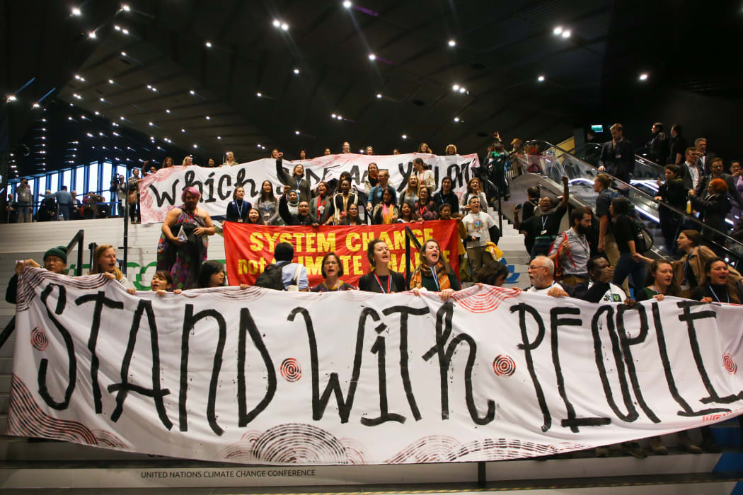 Participants attend demonstration during COP 24, the 24th Conference of the Parties to the United Nations Framework Convention on Climate Change, which takes place on December 2-14. Katowice, Poland on 14 December, 2018.  (Photo by Beata Zawrzel/NurPhoto)