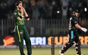 Pakistan's Shaheen Shah Afridi celebrates after taking the wicket of New Zealand's Tim Seifert (R) during the second Twenty20 international cricket match between Pakistan and New Zealand at the Rawalpindi Cricket Stadium in Rawalpindi on April 20, 2024. (Photo by Aamir QURESHI / AFP)