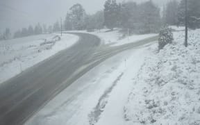 Snow on Jollies Hill, State Highway 6, in Southland on Monday.