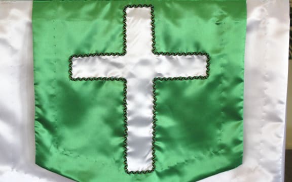 Embroidered cross on altar linen