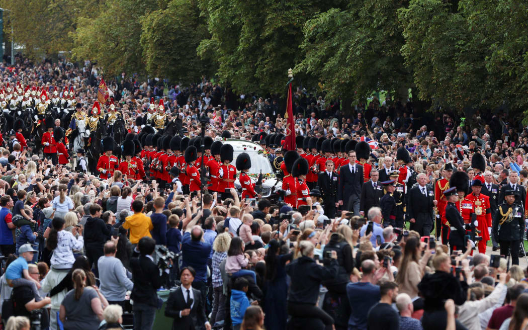 The hearse travels along the Long Walk as it makes its way to Windsor Castle, on the day of the state funeral and burial of Britain's Queen Elizabeth, in Windsor, Britain, September 20, 2022.