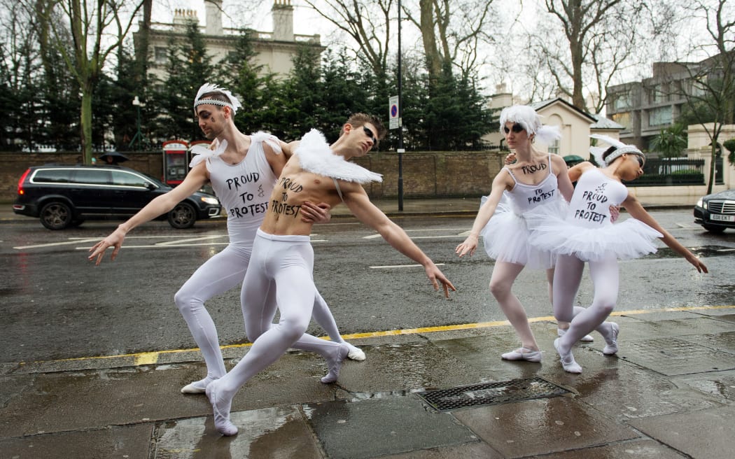 Dancers perform part of Swan Lake at a protest near Russia's embassy.