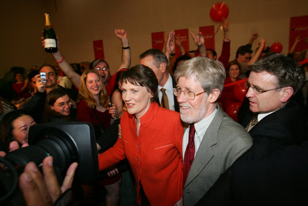 Leader of the Labour Party, and PM, Helen Clark (C), accompanied by her husband Peter Davis (R) arrives at Labour party election headquarters, 17 September 2005.
