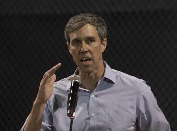 Democratic presidential hopeful and former US Representative for Texas' 16th congressional district Beto O'Rourke speaks to the crowd during a prayer and candle vigil organized by the city, after a shooting left 20 people dead at the Cielo Vista Mall WalMart in El Paso, Texas, on August 4, 2019.