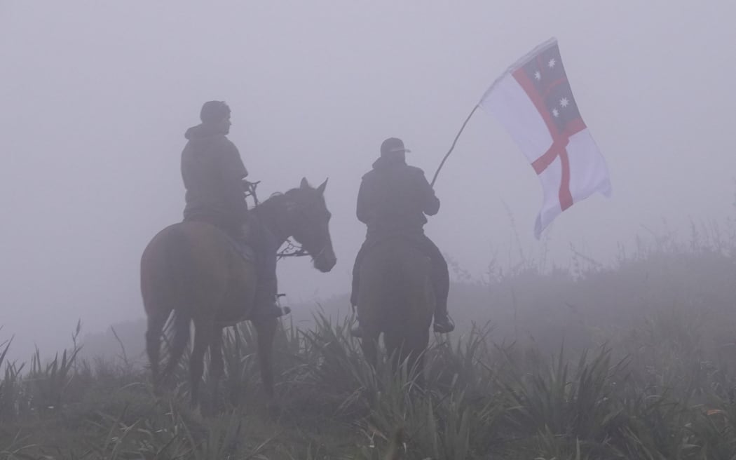 Riders in the mist at Cape Rēinga.